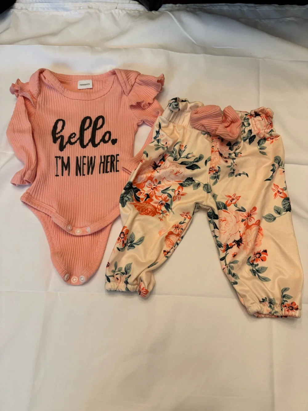 Pink Ribbed Baby Onesie and Floral Pants Set